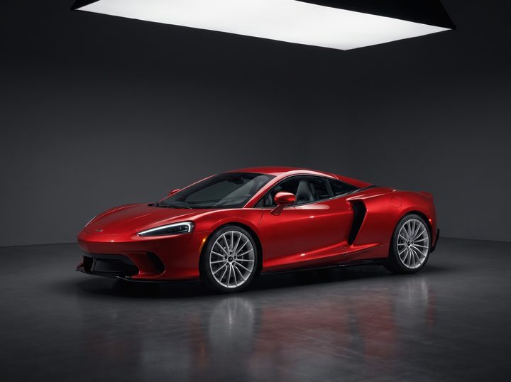 Red McLaren GT, low front three-quarter