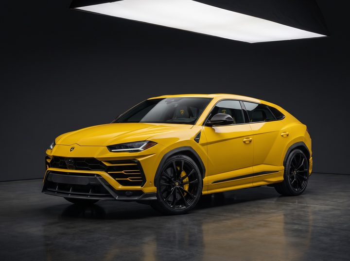 Yellow widebody Lamborghini Urus, low front three-quarter